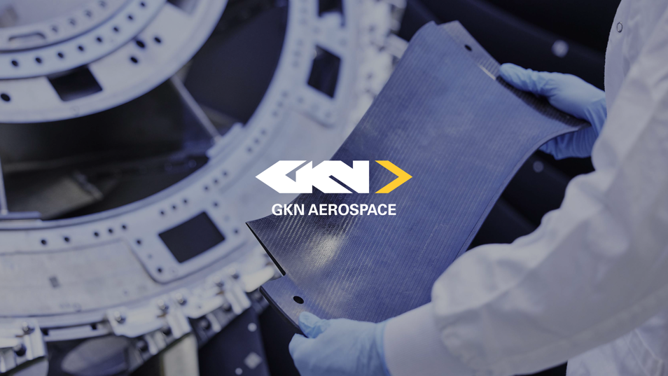GKN Aerospace employee with engineering component in their hands