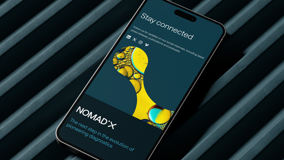 NomadX website homepage on mobile phone